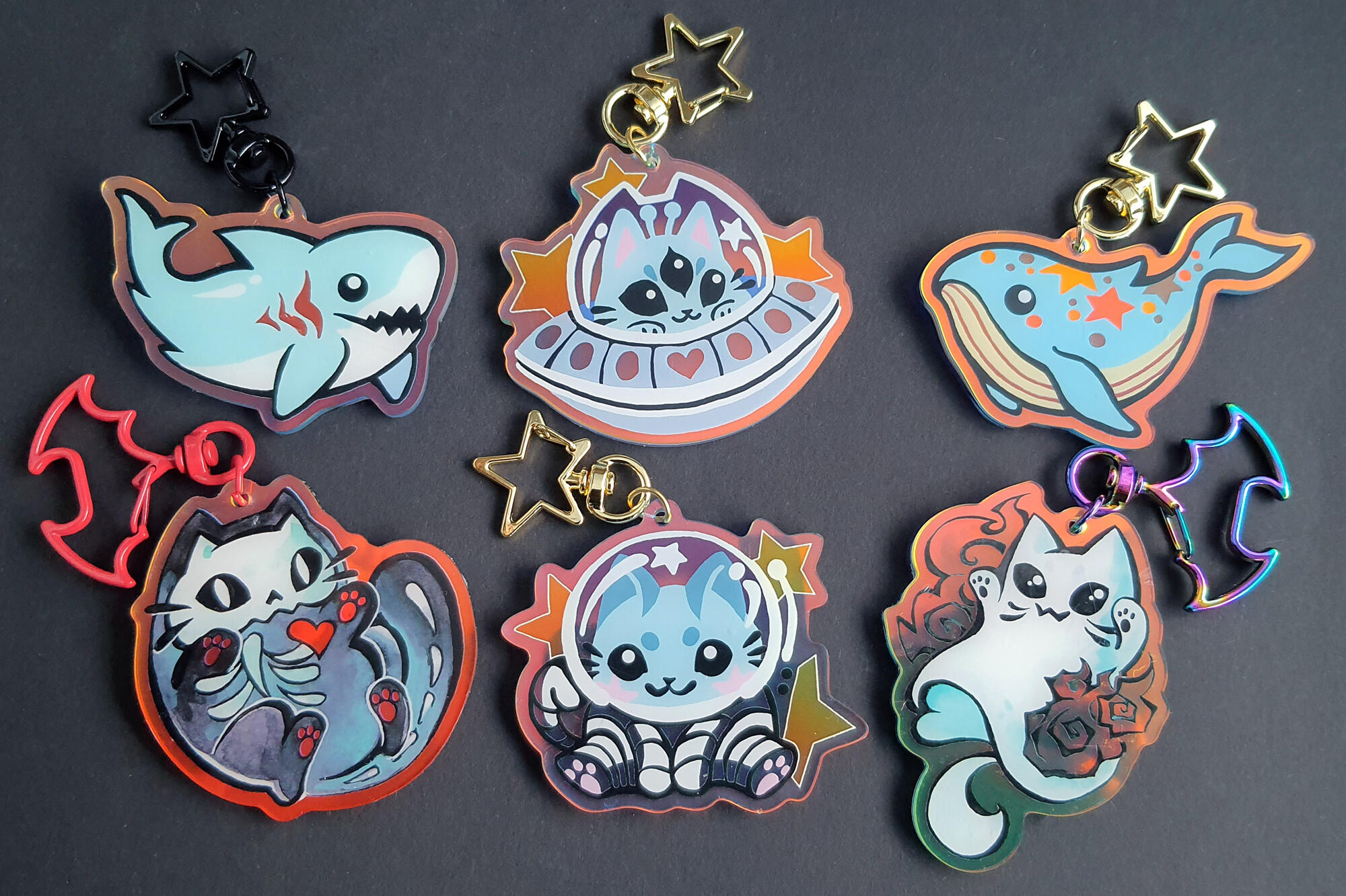 ●Acrylic Keychains● Original designs featuring a shark, space themed cats, starry whale, skeleton and a ghost cat ●●●